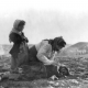 Armenian_woman_kneeling_beside_dead_child_in_field